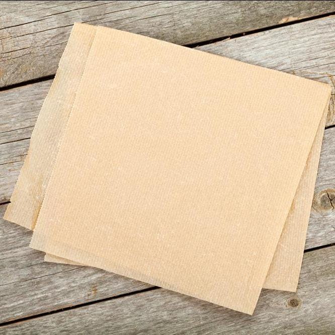 https://naturepac.co.uk/cdn/shop/products/BrownGreaseproofPaper_2000x.jpg?v=1628000065